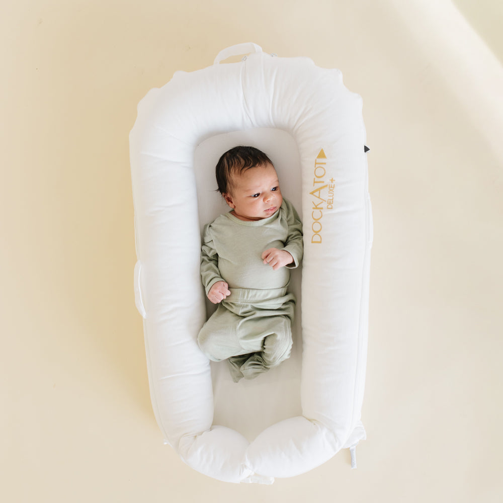 ドッカトット　ベビーベッド　廃盤シクロ柄　トイアーチ付 新生児のくつろぎ空間に｜DockATot公式｜ぬくもり設計のベビーラウンジ